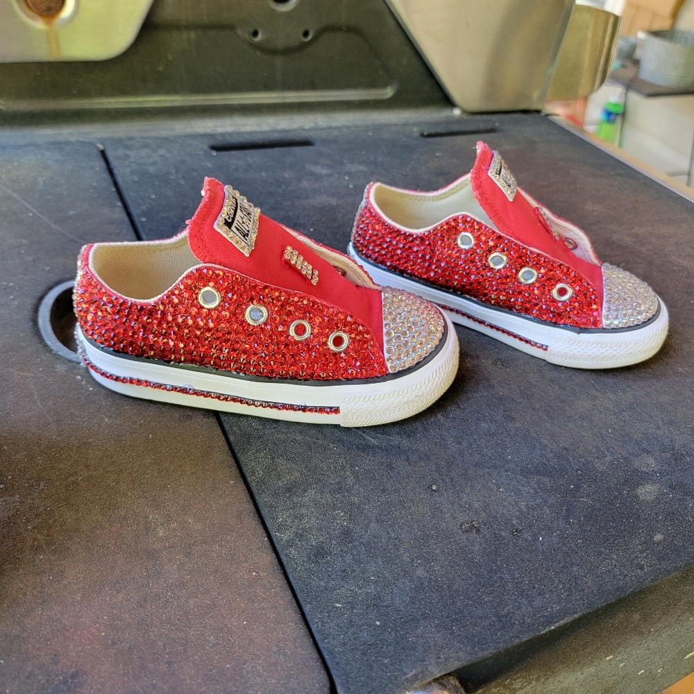 Custom made converse. Each stone is placed 1 by 1